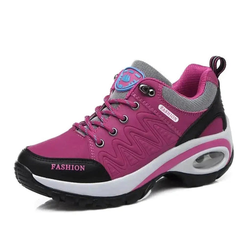 Mandotos running shoes in black and white with cushioned soles and breathable mesh uppers for comfortable athletic wear.