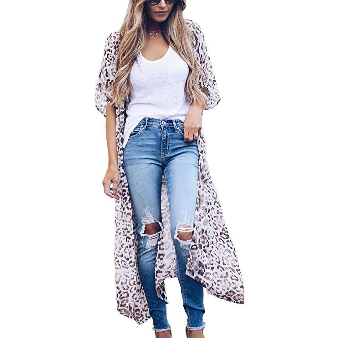 Mandotos Safari Chic Kimono featuring a lightweight, patterned fabric with wide sleeves and a relaxed fit.