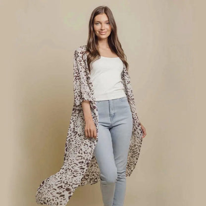 Mandotos Safari Chic Kimono featuring a lightweight, patterned fabric with a relaxed fit and wide sleeves, perfect for casual wear.