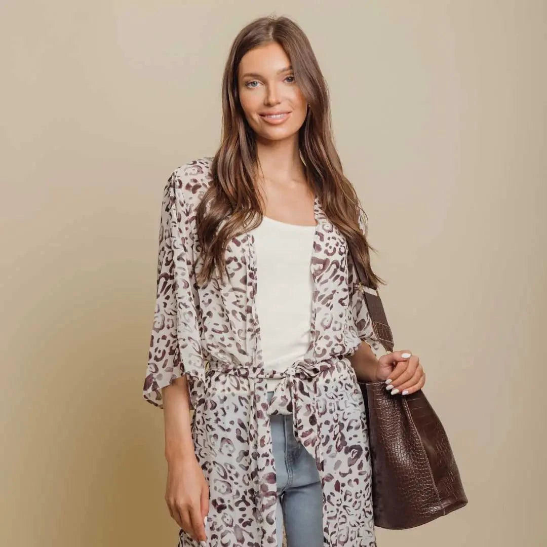 Mandotos Safari Chic Kimono featuring a stylish, lightweight fabric with a safari-inspired print and relaxed fit for casual wear.