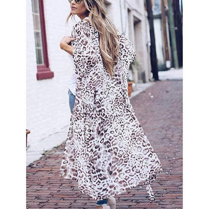 Mandotos Safari Chic Kimono featuring a relaxed fit, animal print pattern, and lightweight fabric for stylish comfort.