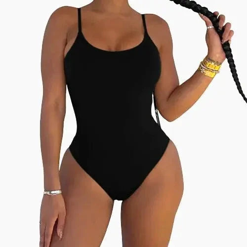Mandotos sculpting beachwear bodysuit shown on a model, highlighting its form-fitting design and smooth fabric for shaping.