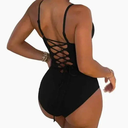 Mandotos Sculpting Beachwear Bodysuit featuring a seamless design and supportive fit for beach or poolside wear.