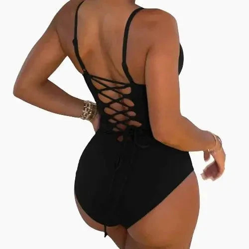 Mandotos Sculpting Beachwear Bodysuit featuring a seamless design and supportive fit for beach or poolside wear.