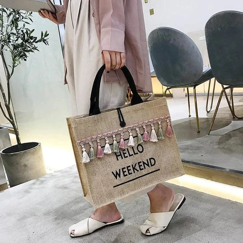 Mandotos seaside style carryall bag with nautical design, featuring sturdy handles and spacious interior for beach or daily use.