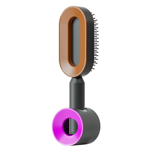 Mandotos self-cleaning hair brush with scalp massage features, showing the brush's bristles and ergonomic handle for easy cleaning.