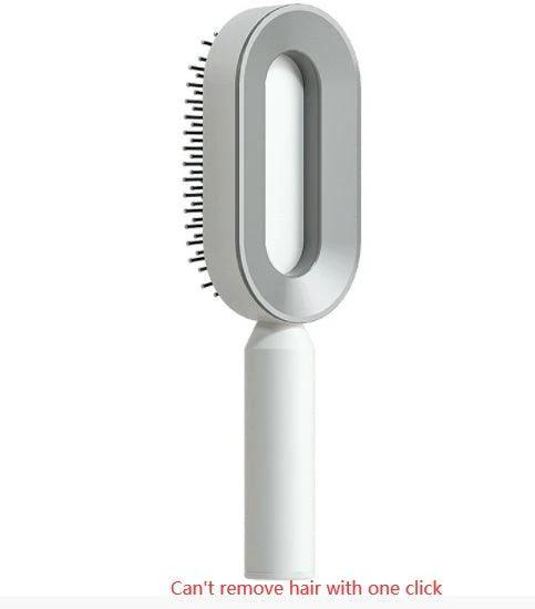Mandotos self-cleaning hair brush with scalp massage features, shown with ergonomic handle and bristles for gentle scalp care.