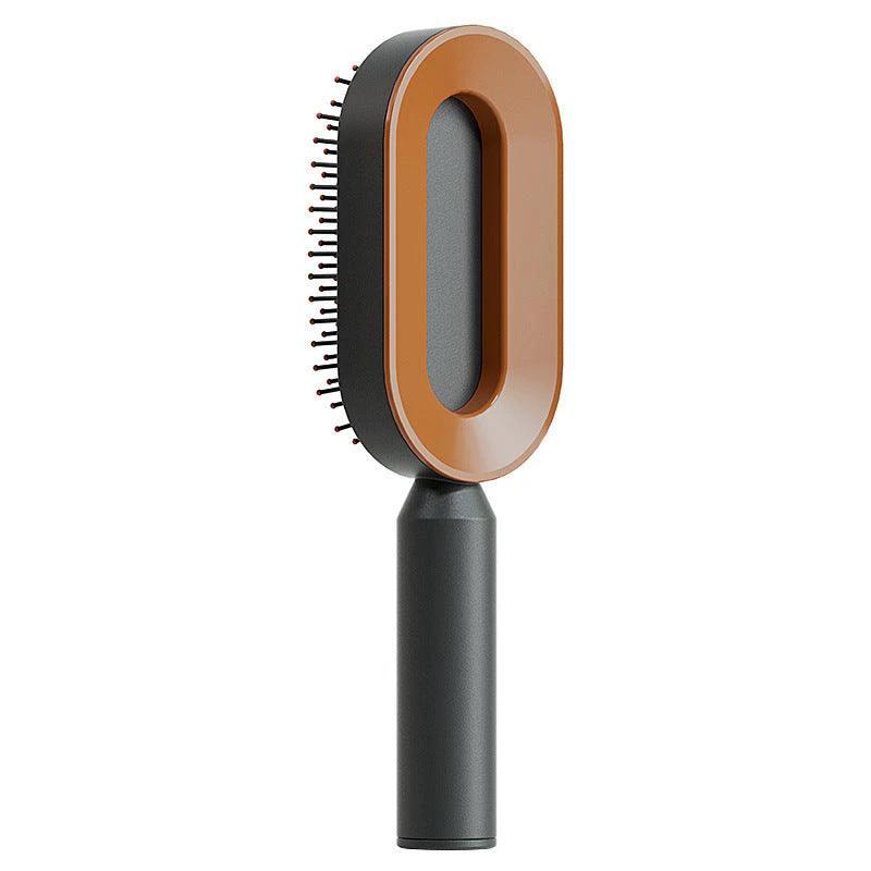 Mandotos self-cleaning hair brush with scalp massage features, showing the brush with ergonomic handle and silicone massage nodes.