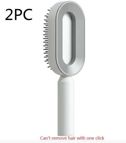 Mandotos self-cleaning hair brush with scalp massage features, shown with ergonomic design and one-click cleaning mechanism.