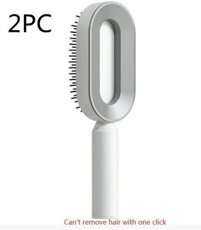 Mandotos self-cleaning hair brush with scalp massage features, shown with ergonomic design and one-click cleaning mechanism.