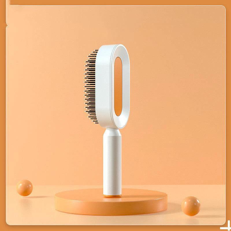 Mandotos self-cleaning hair brush with scalp massage features, designed for easy one-click cleaning and gentle scalp stimulation.