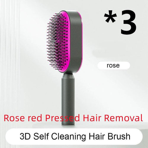 Mandotos self-cleaning hair brush with scalp massage features, showing the brush's bristles and ergonomic handle.