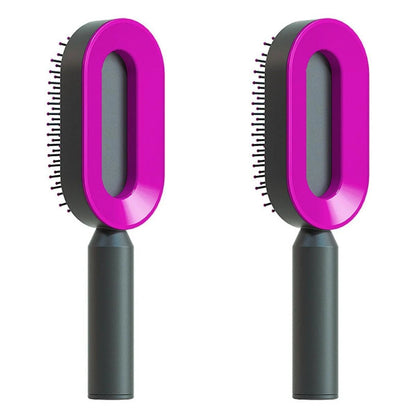 Mandotos self-cleaning hair brush with scalp massage feature and one-click cleaning, showing the brush's bristles and ergonomic handle.