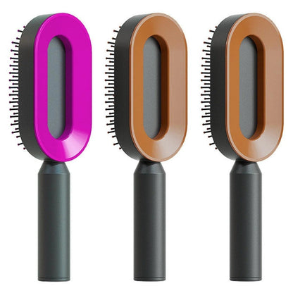 Mandotos self-cleaning hair brush with scalp massage features, showing the brush with ergonomic handle and massage nodes.
