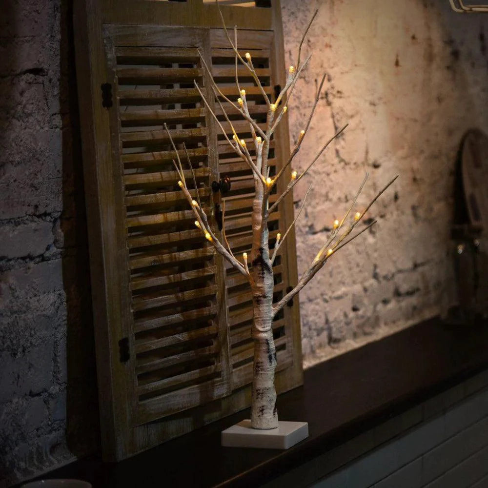 Mandotos Serenity Silver Birch LED Light glowing softly with a silver birch design, perfect for ambient home decor.