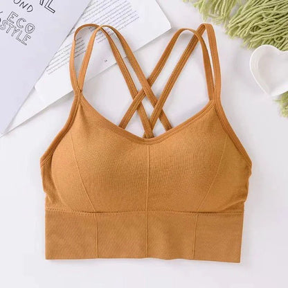 Mandotos women's breathable solid color back cross strap tank top and push-up sports bra for yoga and fitness activities.