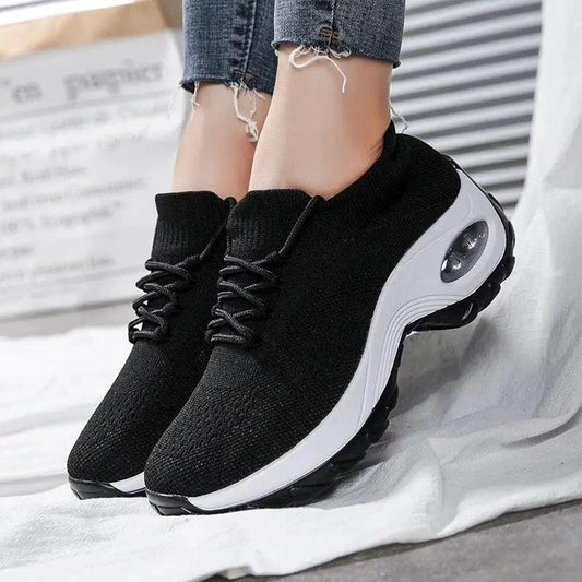 Mandotos women's sports shoes with flying knit sock design, lightweight and flexible athletic sneakers for active wear.