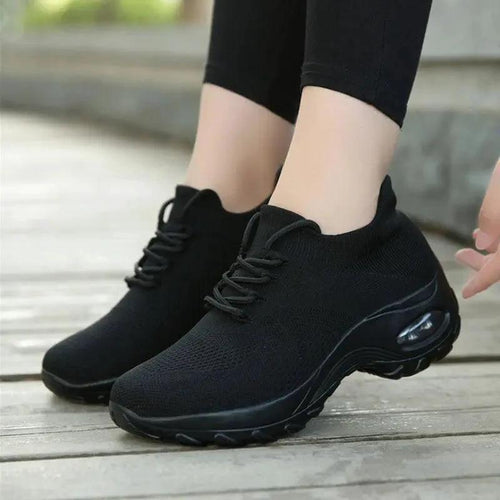 Mandotos women's sports shoes with flying knit design and shaking sole, lightweight athletic footwear for active wear.