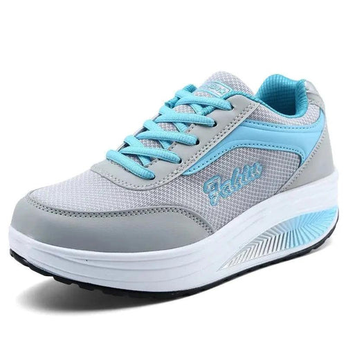 Mandotos women's single travel and sports shoes in black with white accents, lightweight and comfortable for active wear.