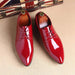 Mandotos sleek leather Oxford shoes showcasing classic design, polished finish, and lace-up style for formal occasions.