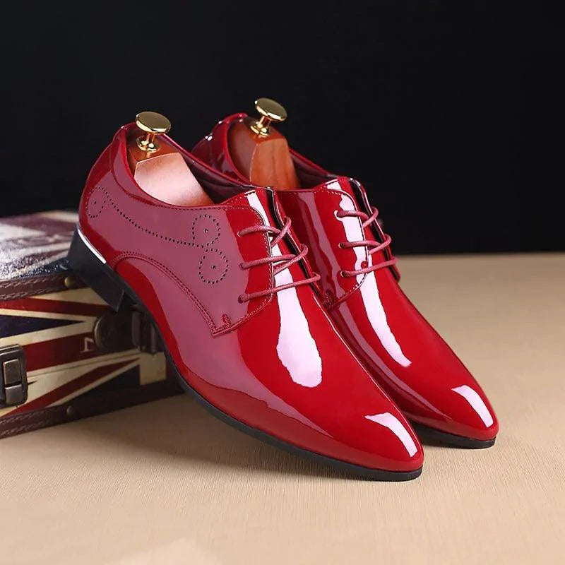 Mandotos sleek leather Oxford shoes with polished finish and classic lace-up design, ideal for formal or business attire.