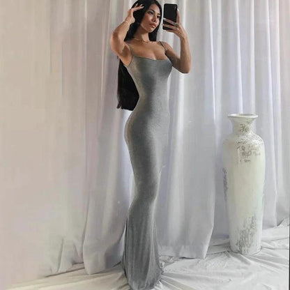 Mandotos sleek satin backless gown featuring a smooth, shiny fabric and elegant design, perfect for formal occasions.