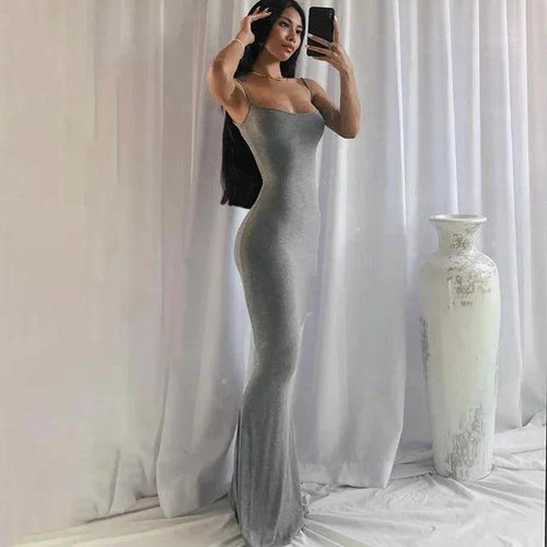 Mandotos sleek satin backless gown featuring smooth fabric and elegant design, perfect for formal occasions.