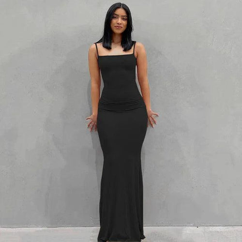 Mandotos sleek satin backless gown featuring smooth fabric and elegant design, perfect for formal occasions.