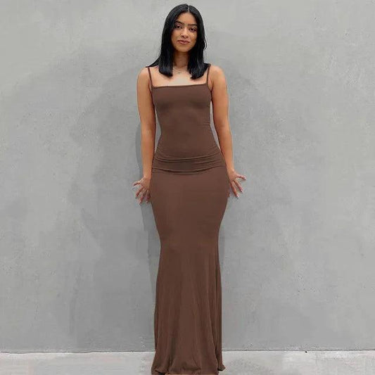 Mandotos sleek satin backless gown flowing elegant evening dress with smooth fabric and stylish design.