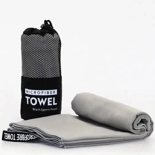 Mandotos Speedy Absorb Microfiber Towel spread out, showing its lightweight, quick-drying fabric ideal for travel and outdoor activities.