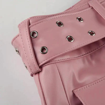 Mandotos Spice faux leather pleated mini skirt with a high waist and stylish pleats, perfect for trendy fashion looks.