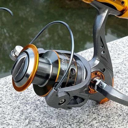 Mandotos SpinMaster Series 1000-7000 fishing reels with black handles and silver body, suitable for freshwater and saltwater fishing.