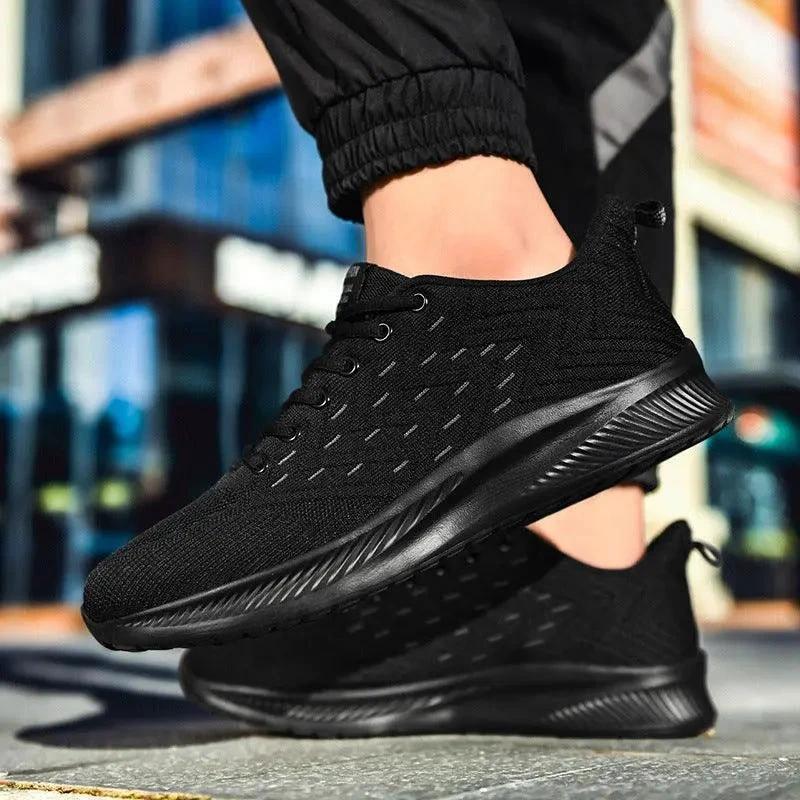 Mandotos Sports Flying Woven Cold Sticky Ultralight casual running shoes with breathable design and lightweight construction.