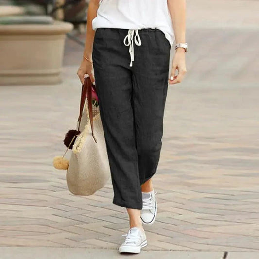Mandotos Summer Elegance drawstring trousers in lightweight fabric, featuring a relaxed fit and adjustable waist for comfortable style.