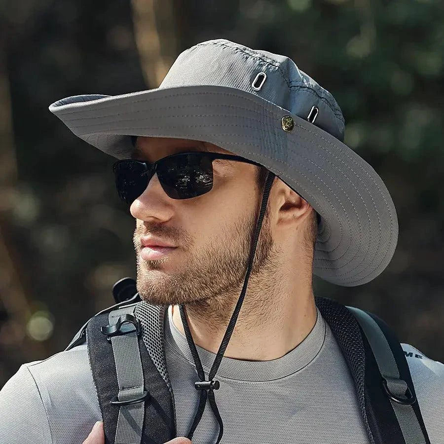 Mandotos sun-safe stylish bucket hat with wide brim and adjustable strap, ideal for outdoor sun protection.