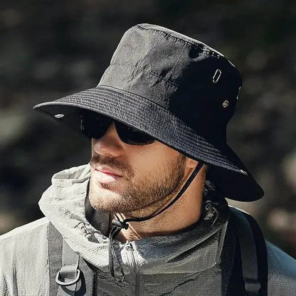 Mandotos sun-safe stylish bucket hat with wide brim, lightweight fabric, and adjustable chin strap for outdoor sun protection.