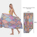 Mandotos SwiftDry patterned beach towel with colorful geometric design, soft fabric, perfect for sunbathing and beach days.
