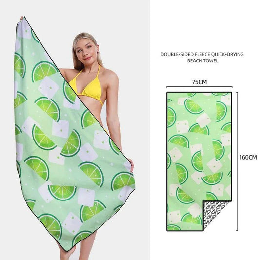 Mandotos SwiftDry patterned beach towel with vibrant geometric design, soft cotton material, perfect for seaside relaxation.