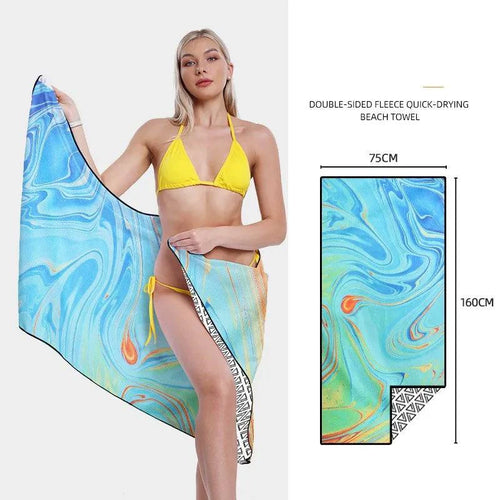 Mandotos SwiftDry patterned beach towel with vibrant geometric design, ideal for beach and poolside use.
