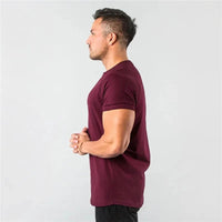 Mandotos men's casual short sleeve muscle fit T-shirt, ideal for gym, fitness, and streetwear, with slim fit summer style.