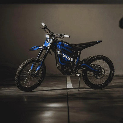 Mandotos Talaria off-road electric motorcycle with 4000w motor, 85km/h speed, and 60v45ah battery in rugged outdoor setting.