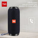 Mandotos TG117 Bluetooth portable waterproof TWS outdoor speaker placed on a surface with a nature background.