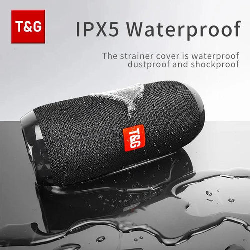 Mandotos TG117 Bluetooth portable waterproof TWS outdoor speaker on a surface, showing compact design and control buttons.