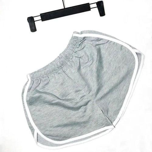 Mandotos women's thin summer elastic shorts with quick-drying fabric, loose fit, and anti-external wear for outdoor comfort.
