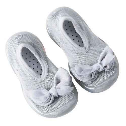 Mandotos toddler shoes in soft fabric with Velcro straps, designed for comfort and easy wearing for young children.