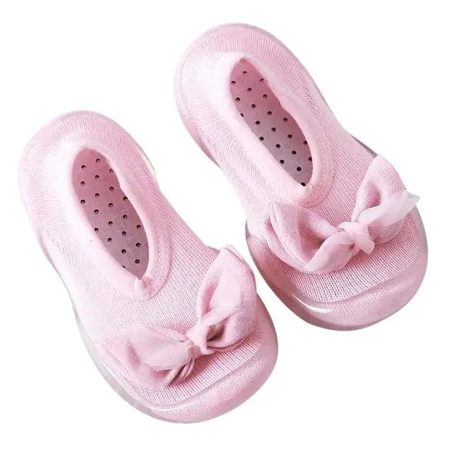 Mandotos toddler shoes in soft fabric with Velcro straps, designed for comfort and easy wear for young children.