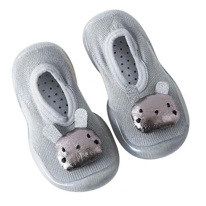 Mandotos toddler shoes in soft fabric with velcro straps, designed for young children and easy to put on.