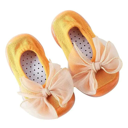 Mandotos toddler shoes in soft fabric with velcro straps, featuring playful colorful patterns for young children.
