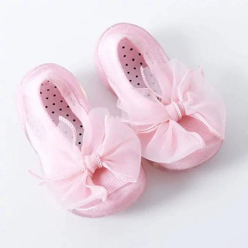 Mandotos toddler shoes in soft fabric with velcro straps, designed for comfort and easy wear for young children.