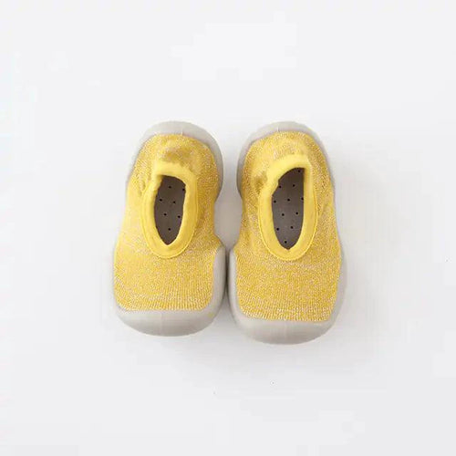 Mandotos toddler shoes in soft fabric with velcro straps, designed for comfort and easy wear for young children.